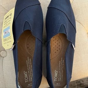 Never worn navy blue TOMS.